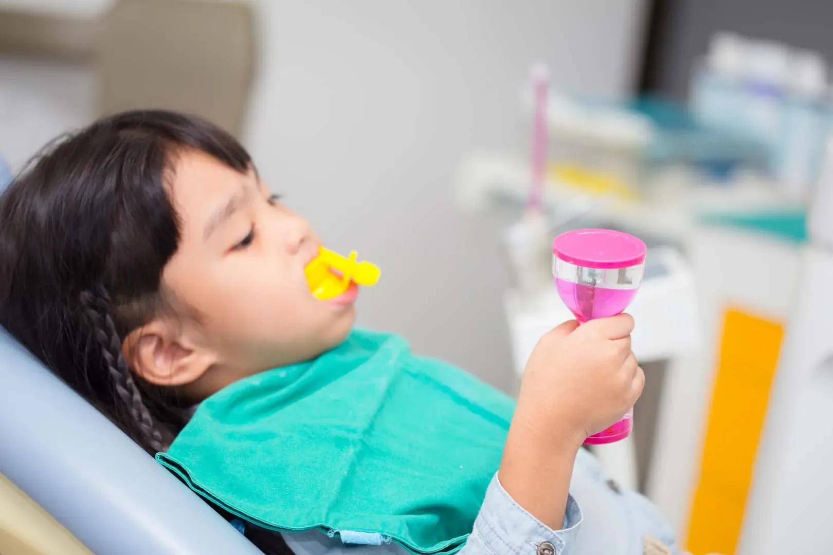 Fluoride treatment to strengthen tooth enamel